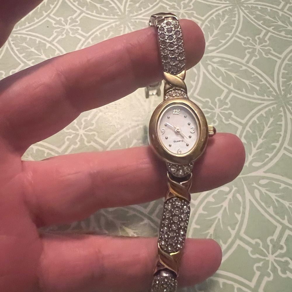 Dainty vintage ladies gold watch with crystal accent $10